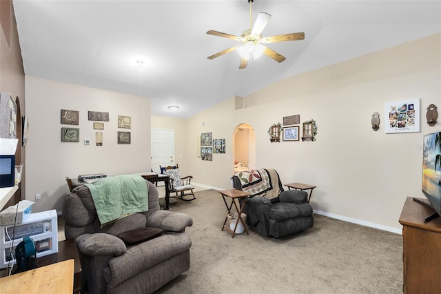 living room featuring carpet, lofted ceiling, and ceiling fan