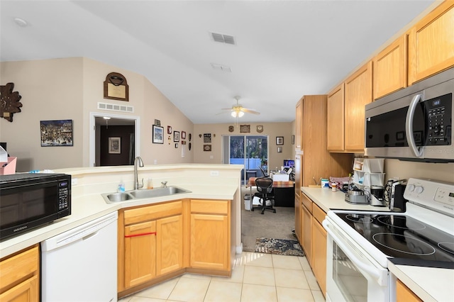 kitchen featuring light brown cabinetry, sink, light tile patterned floors, ceiling fan, and white appliances