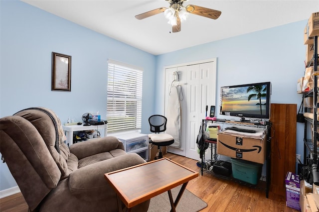 interior space featuring ceiling fan and light wood-type flooring