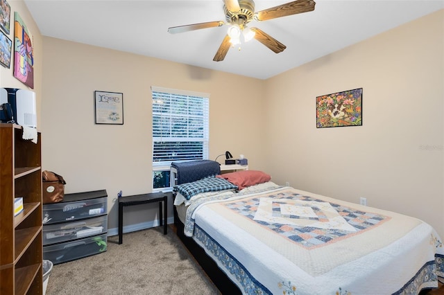 bedroom featuring ceiling fan and light colored carpet