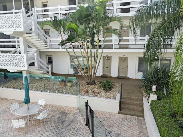 surrounding community featuring a patio area