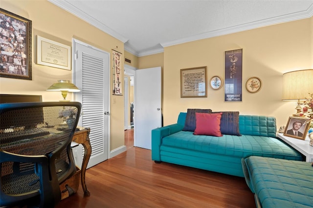 living room with ornamental molding and dark hardwood / wood-style floors