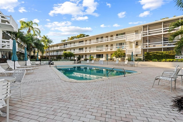 view of pool featuring a patio