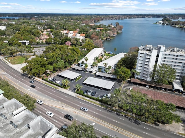 birds eye view of property featuring a water view