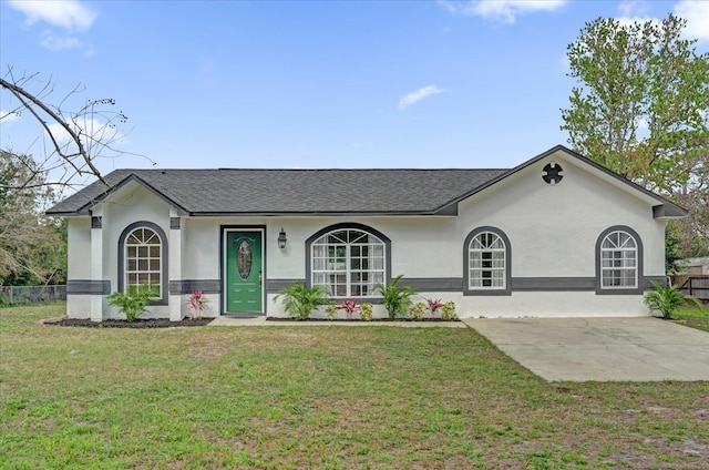 ranch-style house with a front lawn