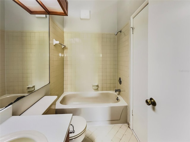 full bathroom with vanity, toilet, tiled shower / bath combo, and tile patterned flooring