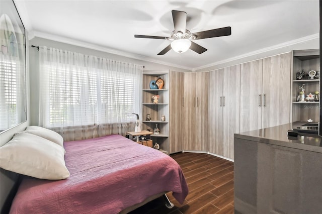 bedroom with crown molding and ceiling fan