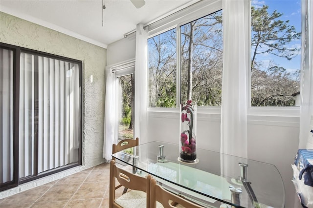 sunroom / solarium with ceiling fan