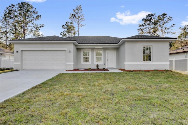 ranch-style home featuring a front lawn, concrete driveway, an attached garage, and stucco siding