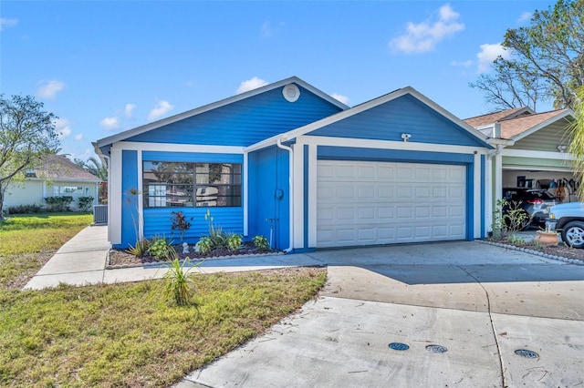 ranch-style house featuring a garage