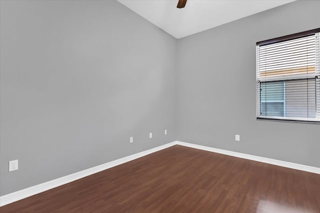 empty room with wood-type flooring and ceiling fan