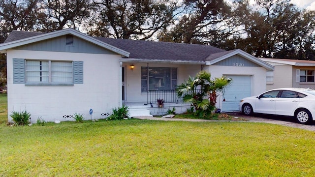 ranch-style home featuring a garage, covered porch, and a front lawn