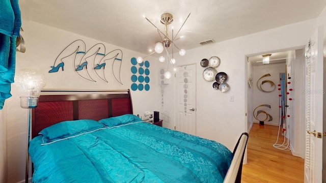 bedroom featuring hardwood / wood-style floors