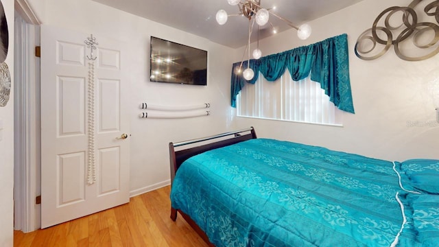 bedroom with light wood-type flooring