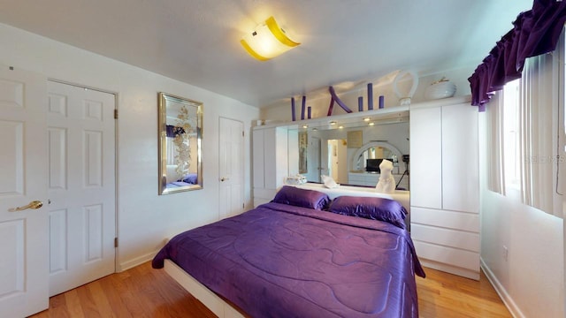 bedroom featuring hardwood / wood-style flooring