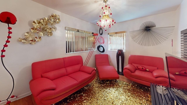 living room featuring a notable chandelier