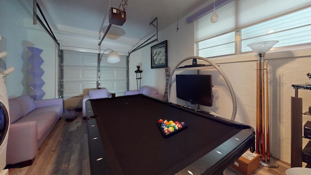 playroom featuring dark hardwood / wood-style floors and pool table