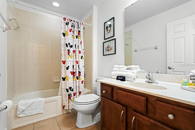 full bathroom with toilet, tile patterned flooring, shower / tub combo with curtain, and vanity