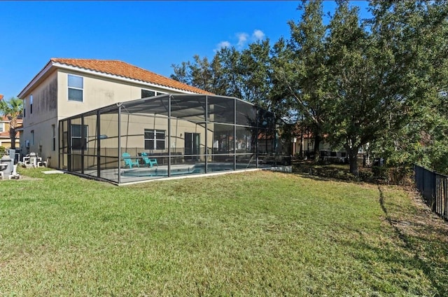 view of yard featuring a patio and a lanai