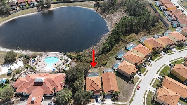 birds eye view of property featuring a water view