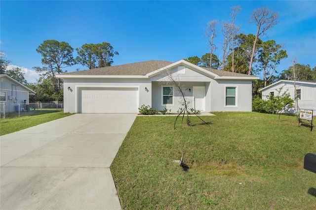 ranch-style home with a garage and a front yard