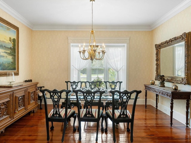 dining room with baseboards, a chandelier, dark wood finished floors, and ornamental molding