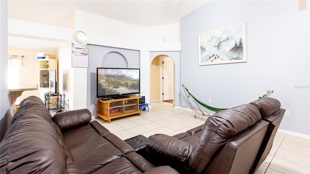 living room featuring light tile patterned flooring