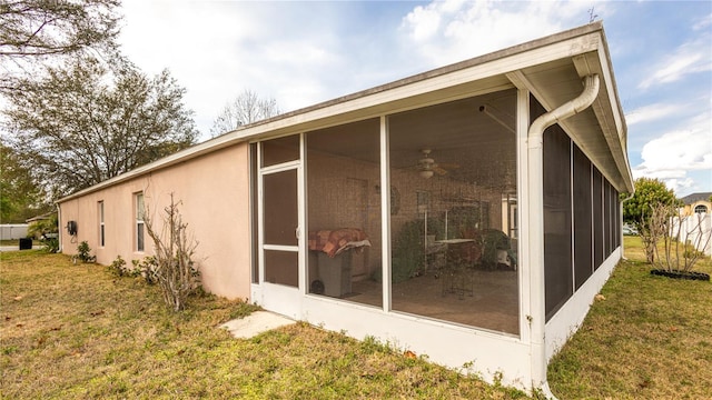 view of side of property featuring a yard