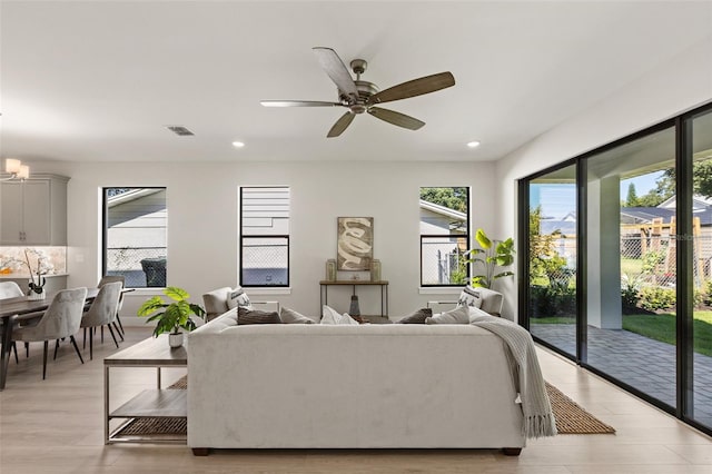 living room with ceiling fan