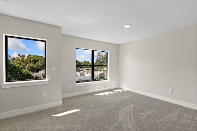 view of carpeted spare room