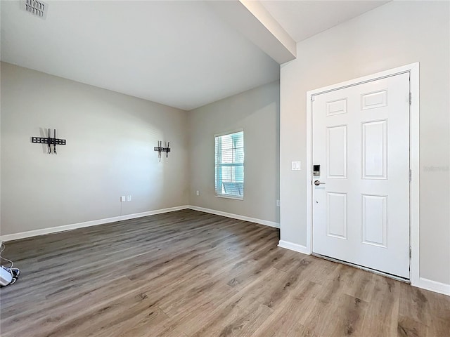 entrance foyer with light hardwood / wood-style floors