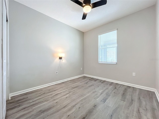 unfurnished room featuring ceiling fan and light wood-type flooring