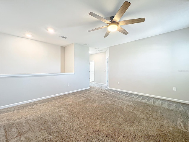 unfurnished room featuring carpet floors and ceiling fan