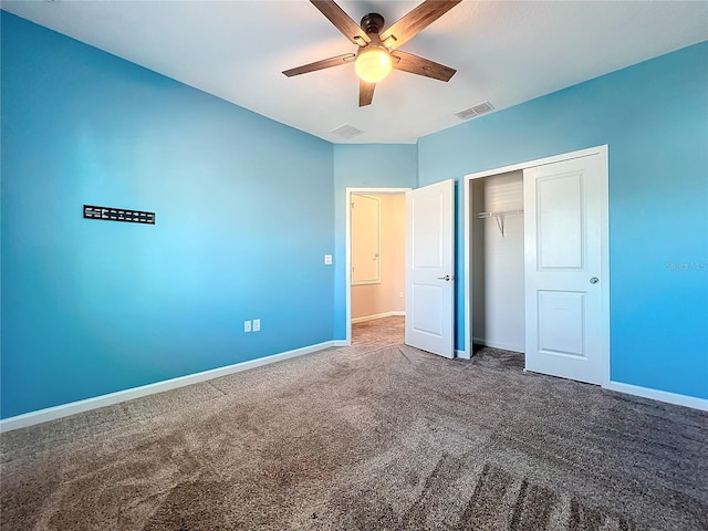 unfurnished bedroom featuring a closet, ceiling fan, and carpet flooring