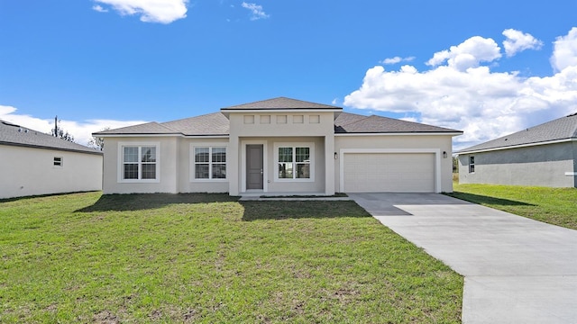 view of front of home with a garage and a front lawn