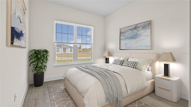 bedroom with light hardwood / wood-style floors