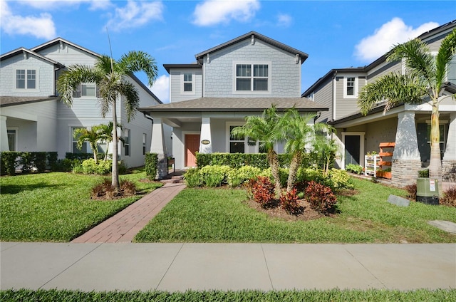 craftsman-style house with a front yard