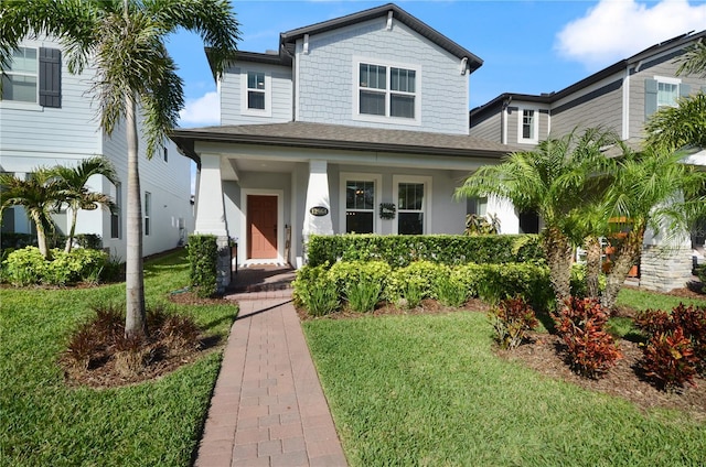 view of front of property featuring a front lawn