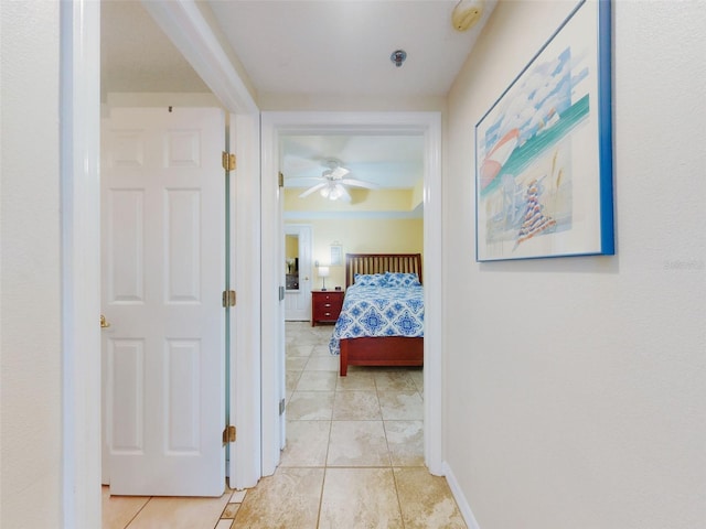 bedroom with light tile patterned flooring