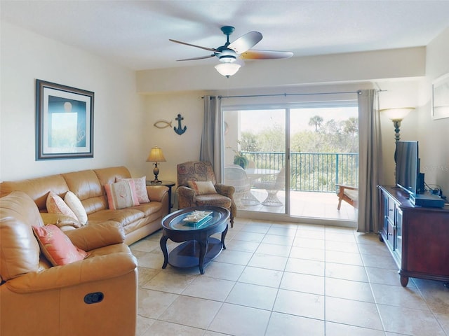 tiled living room featuring ceiling fan