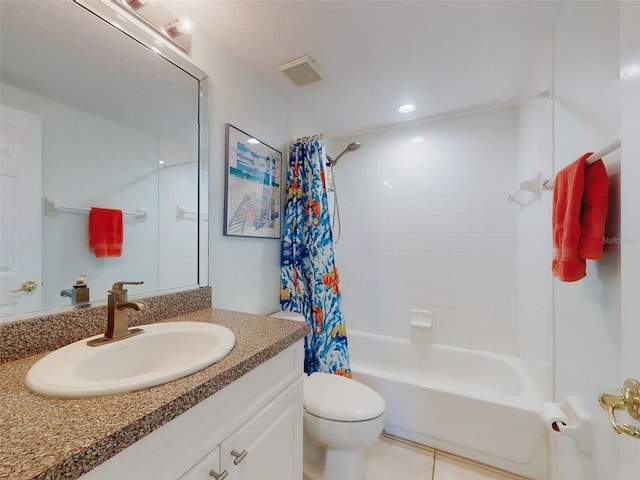 full bathroom featuring shower / tub combo with curtain, vanity, tile patterned floors, and toilet