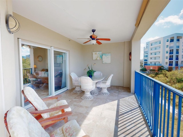 balcony featuring ceiling fan