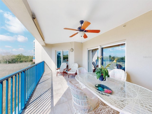 balcony featuring ceiling fan