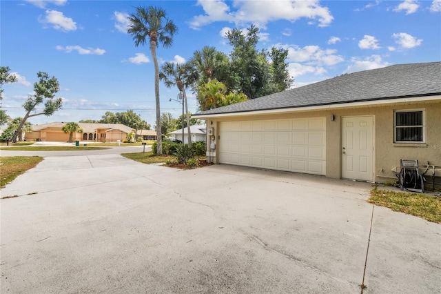 view of property exterior with a garage