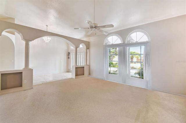 carpeted empty room with ceiling fan