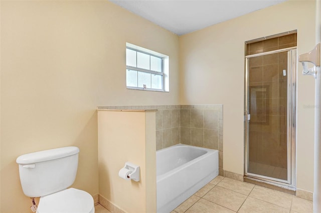 bathroom with tile patterned flooring, plus walk in shower, and toilet