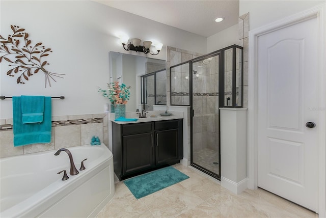 619 Meadow Sage Dr, Deland, FL 32724 - bathroom with vanity, shower with separate bathtub, and a textured ceiling