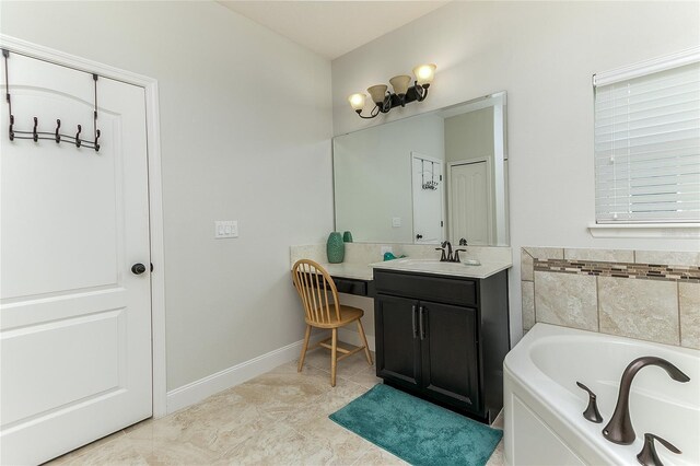 619 Meadow Sage Dr, Deland, FL 32724 - bathroom with vanity, tile patterned floors, and a bathing tub