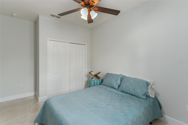 619 Meadow Sage Dr, Deland, FL 32724 - bedroom featuring ceiling fan and a closet