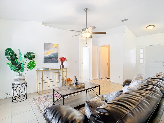 living room featuring light tile patterned floors and ceiling fan